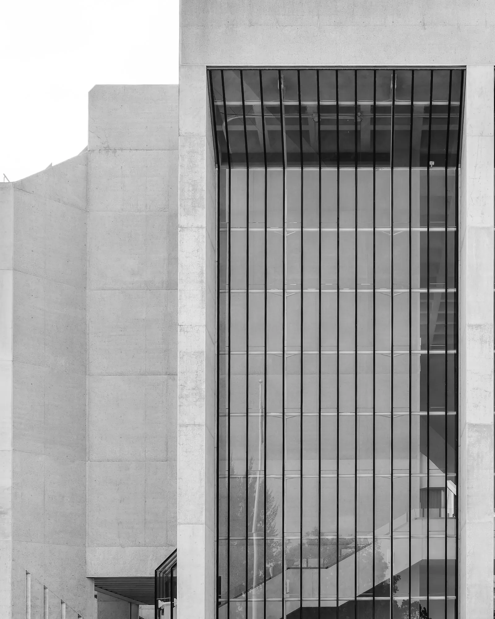 Concrete facade and tall windows