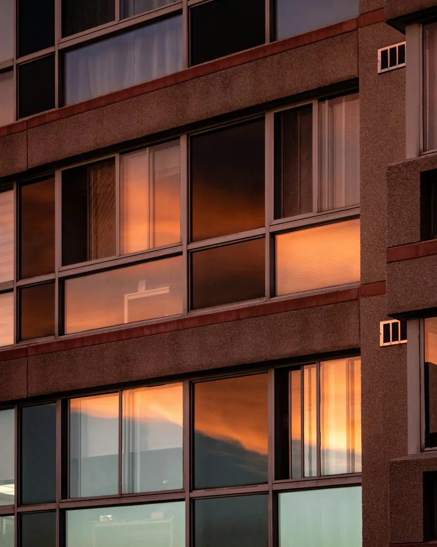 Warm evening light reflected in a building facade